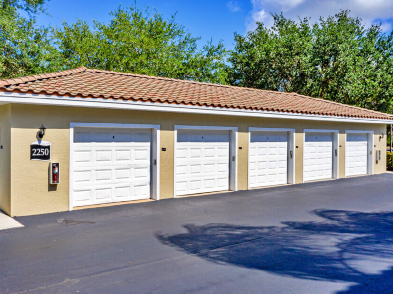 This image shows the Malibu Lakes Apartments with the detached garages.