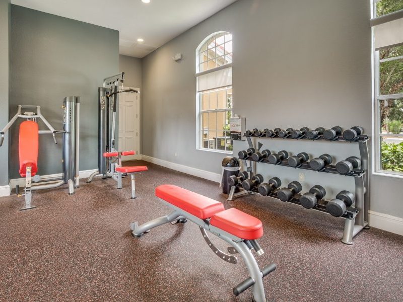 This image showcase the commercial fitness with State-of-the-art 2-level athletic club with Matrix Series 7xi equipment that is essential for community amenities, and offering indoor cycle.