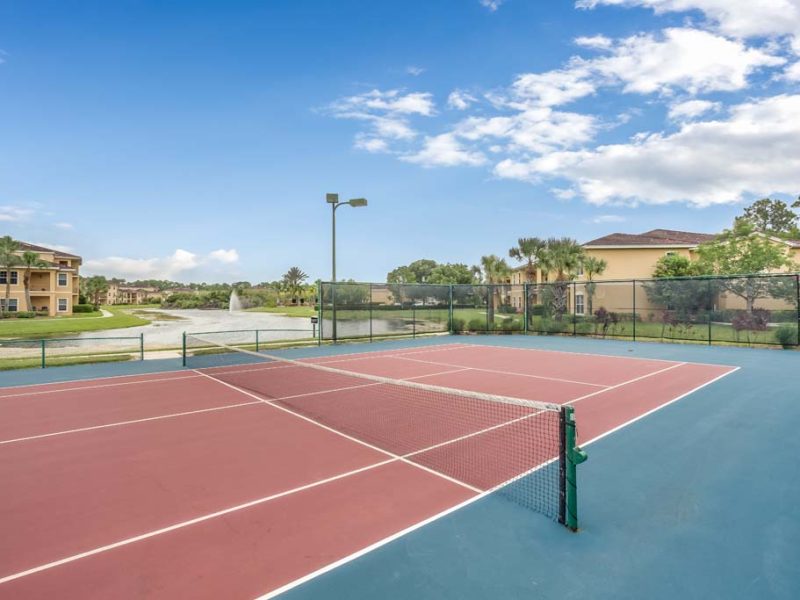 "This image shows the premium community amenities, showing the ideal lighted tennis court spacious area for both players and audiences. "