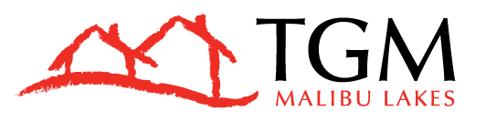 TGM Malibu Lakes Apartments logo with red mountains in Naples, Florida.