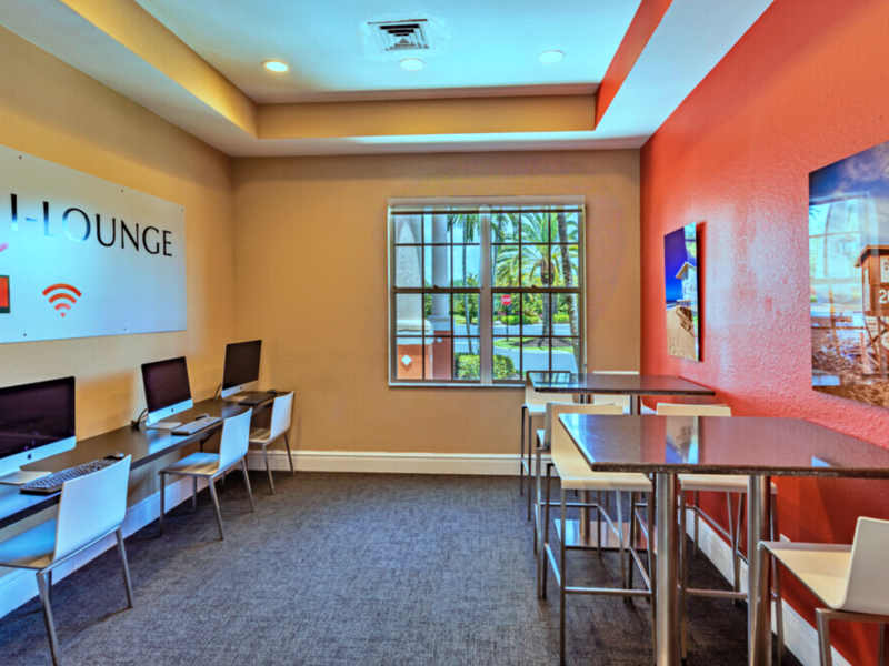 This image shows the oversized clubhouse with complimentary WiFi and an apple computer bar.