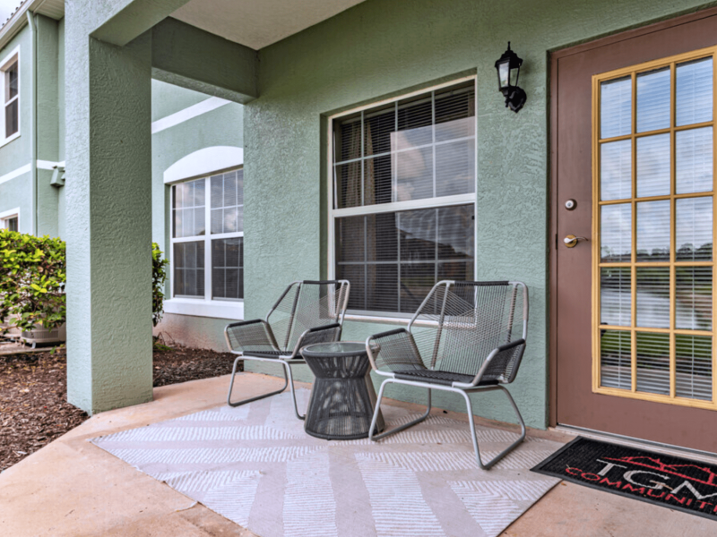 This image shows the balcony with a café table and a chair. You can always have a cup of coffee here while enjoying the scenic view outside.