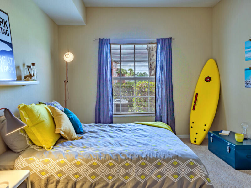 This image shows the premium apartment feature, particularly the bedroom area featuring the double hang window to overlook the outside view.