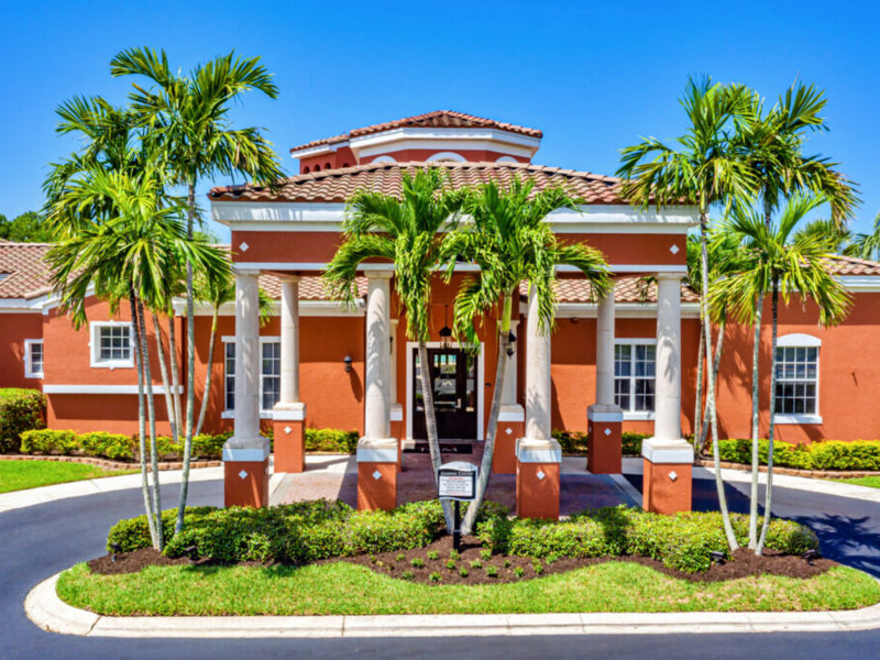 This image shows the entrance view of the TGM Malibu Lakes Apartments.