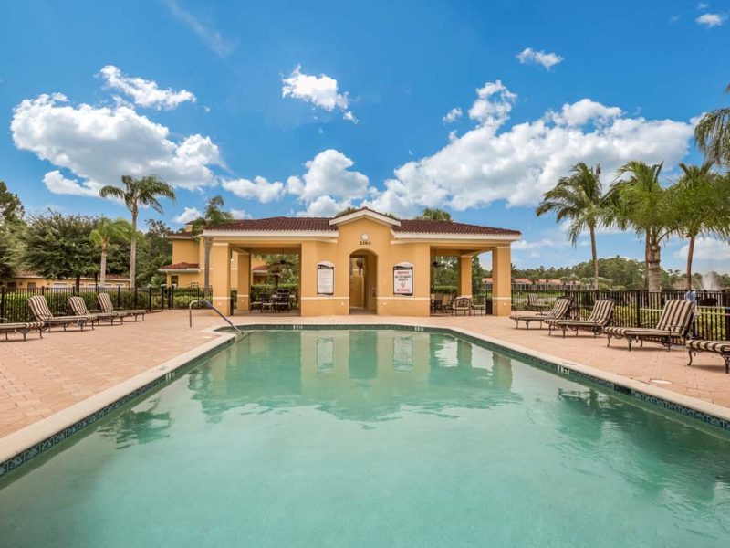 This image shows the resort-style outdoor swimming pool with a glittering sky blue water that was admirable for the fun bond with friends and family.